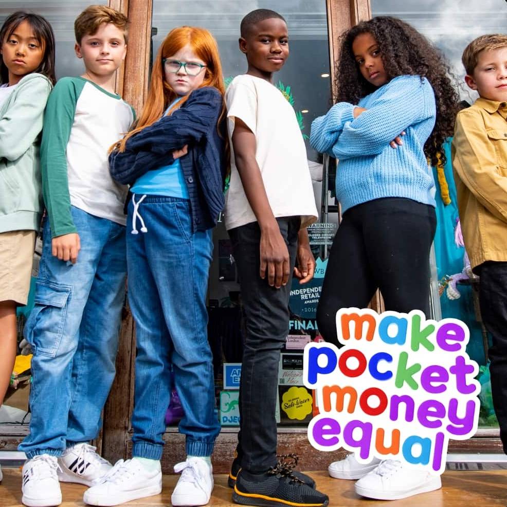 Kids standing in front of a shop